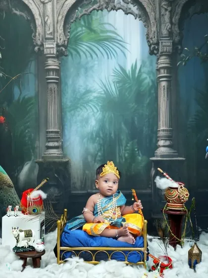 This full view of the Krishna setup shows the grandeur of the backdrop with ancient arches and lush greenery, making for a truly epic portrait.