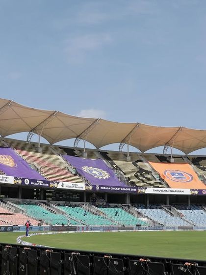 The stadium stands adorned with team banners for the Kerala Cricket League. We handle all aspects of stadium dressing and branding.