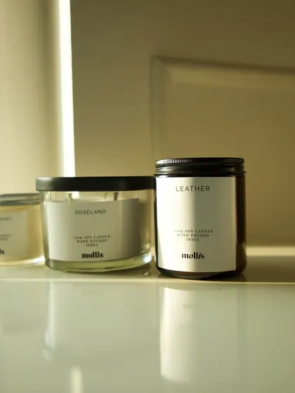 My 250g candle is perfect for larger spaces like a living room, shown here next to the 200g 'Leather' candle.