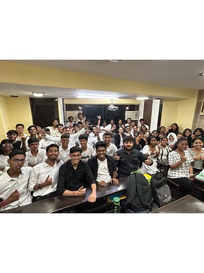 The energy and enthusiasm of our students is contagious. Here is a full classroom celebrating Black and White Day, showing the strong sense of community we build among our batches.