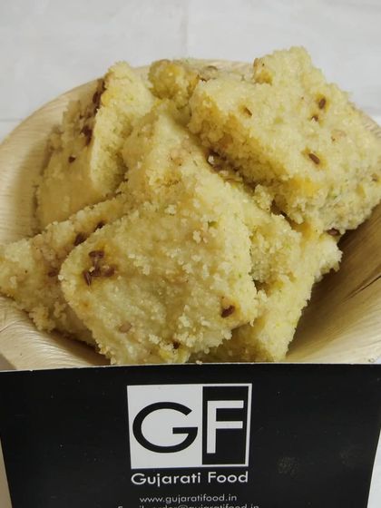 This is Khichu, a simple and comforting savory porridge made from rice flour and seasoned with cumin. It's a light and healthy snack, often enjoyed warm.