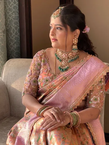 Another angle of this soft and pretty guest makeup. The sunlight catches the highlighter on her cheeks, giving her a beautiful glow.