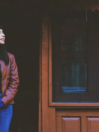 While wandering through Himachal, I captured this shot of a woman looking out from a traditional wooden home. It reflects my love for travel and finding beauty in the simple, unguarded moments of everyday life against the backdrop of the mountains.