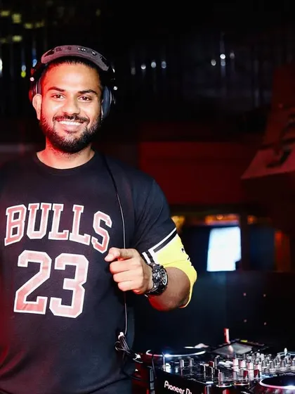 A smile for the camera during a great weekend gig at Growl. I genuinely love what I do, and I think it shows in my performances.
