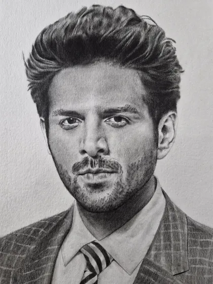 A sharp and stylish portrait of Bollywood actor Kartik Aaryan, perfect for any fan of his work.