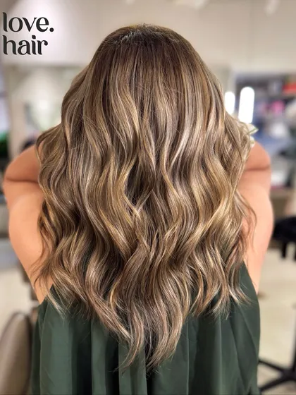 This is that perfect "Pinterest hair" you've been saving. A beautiful bronde balayage with buttery, champagne blonde highlights that blend seamlessly for a luxurious, sun-kissed finish.