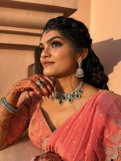 A close up of my client enjoying her special day in the custom langa davani. The color combination and fit look beautiful on her.