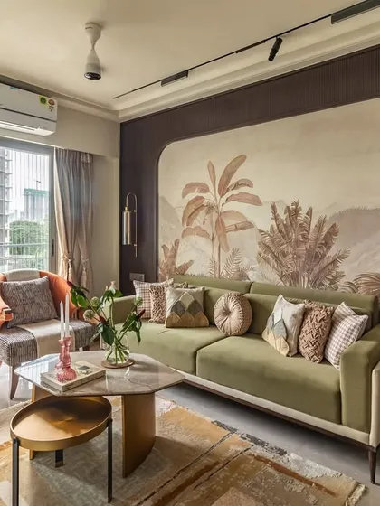 A living room where elegance meets earthy charm. I used a sage green sofa as the anchor, complemented by a botanical wallpaper and layered textiles to create a space that feels both exquisite and serene.