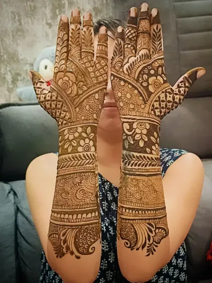 Another view of the same floral back-of-hand design, showing the full coverage.