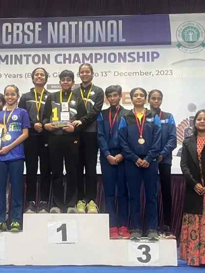 Our girls' team on the podium at the CBSE National Badminton Championship. Standing on the podium is the goal we train for every day.
