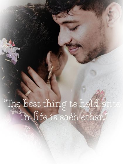 "The best thing to hold onto in life is each other." This quote perfectly complements the intimate close up of the couple during their engagement ceremony.