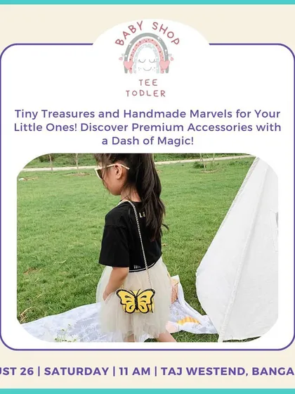 Tee Todler offers premium handmade accessories with a dash of magic. This little girl looks so chic with her butterfly bag, a perfect find at the market.