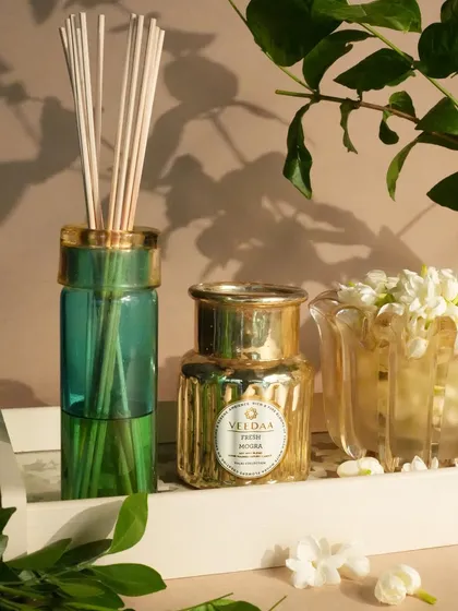 A curated selection from our extensive product portfolio, showcasing the diverse range of fragrances, colors, and designs we offer. Each image highlights the beauty and versatility of our candles, diffusers, and gift sets.