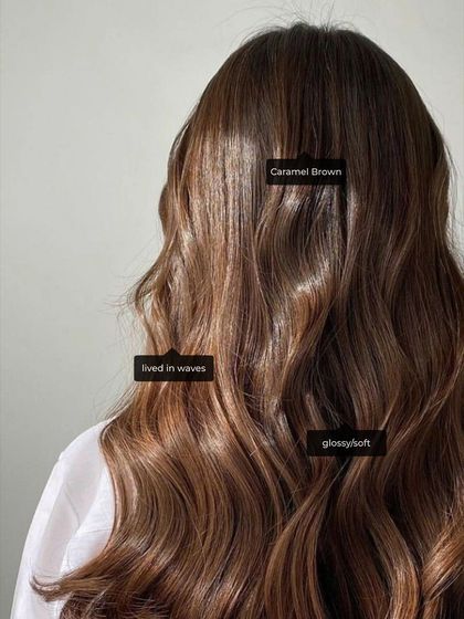 A beautiful example of a glossy, caramel brown look. Our students learn to create these popular and timeless shades with lived-in waves.