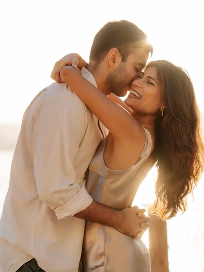 An intimate embrace during a golden hour session in Dubai. The warm, soft light creates a dreamy and romantic atmosphere that I love to capture.