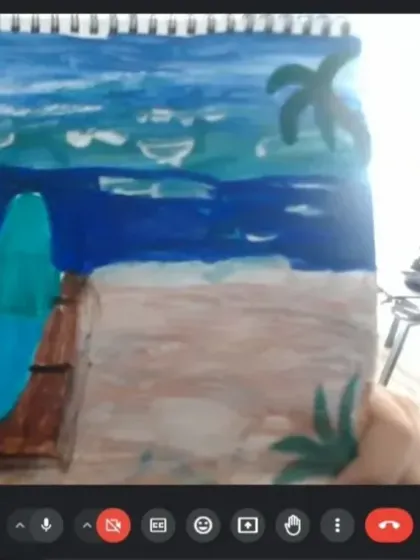 A student from my online class proudly displays his vibrant surfboard painting. I guide them step-by-step to create beautiful art from home.