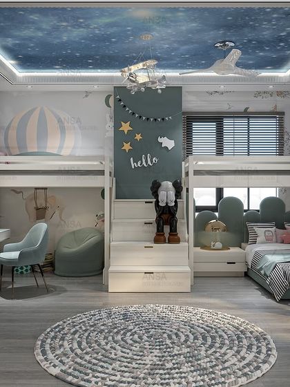 Another fantastic kids' room design, this one featuring bunk beds with a fun staircase, a starry sky ceiling, and plenty of space to play. It's a room designed to spark imagination and adventure.