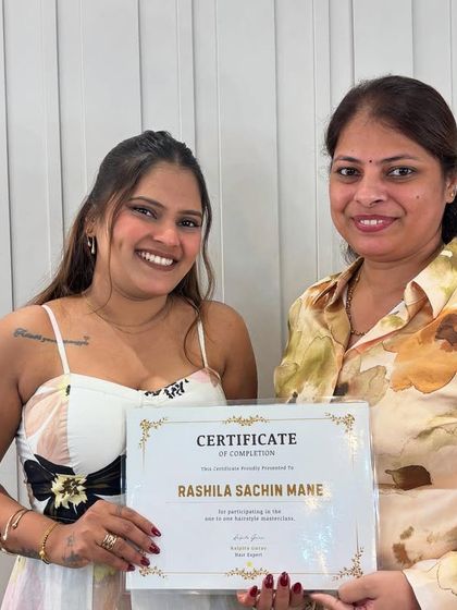 Celebrating another successful student, Rashila, as she receives her certificate. She worked hard and mastered many new techniques during our 6-day hairstyling course.