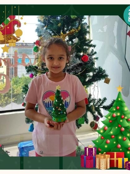 Another happy student with her handmade clay Christmas tree from our festive workshop. These activities allow kids to create their own holiday decorations and memories.
