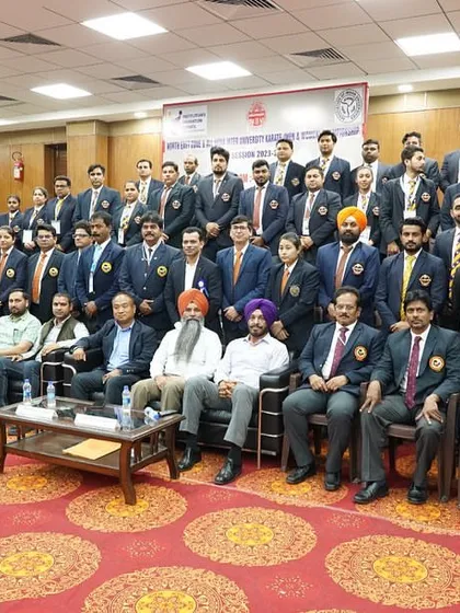 A series of photos showing the dedicated group of officials, judges, and technical committee members from the North East Zone & All India University Karate Championship. It takes a large, coordinated team to run a successful national-level event.