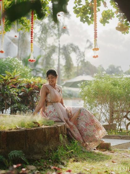 A dreamy, atmospheric shot of the bride in her soft reception look. The makeup feels like poetry, perfect for a bride in her soft era.