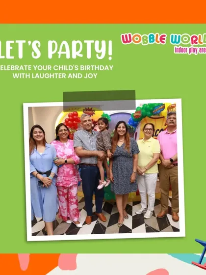 Let's party. A family photo capturing the joy and laughter of a birthday celebration at Wobble World.