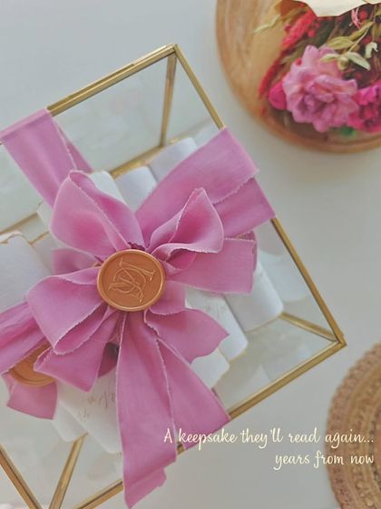 A keepsake they will read again, years from now. The final presentation of my handwritten vows, beautifully boxed and sealed, ready to become a family treasure.