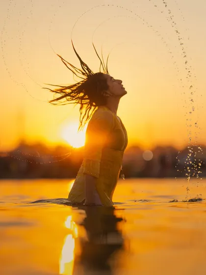 A moment of pure release and surrender to the elements. The Ganga has a way of washing away more than just the dust; it cleanses the soul. This is the feeling I hope to share, the freedom found in letting go.