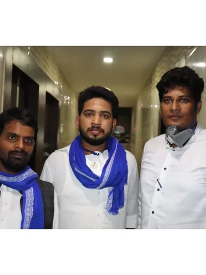 With friends and fellow activists. We are united in our goal to fight for the rights and dignity of every individual in our society.
