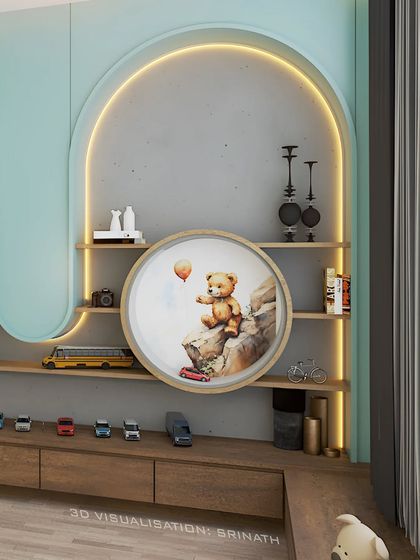 A close-up of the study and display unit in the kids' bedroom, featuring arched niches and a cute teddy bear art piece.