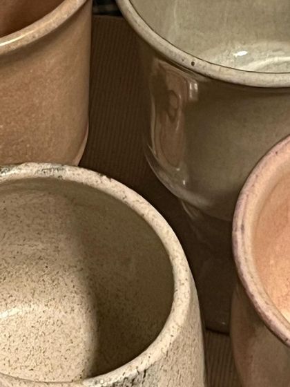 A close-up of the different glazes used for the goblet collection. We experimented with various colors and textures to create a unique and harmonious palette.