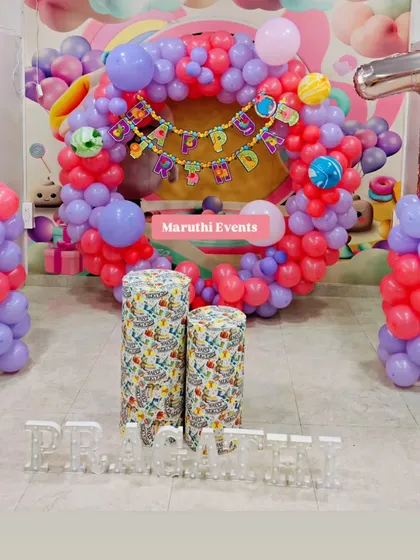 A colorful balloon ring for Pragati's first birthday, using a variety of bright colors.
