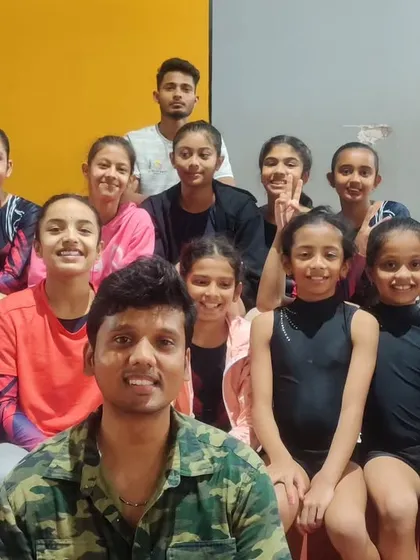 A group photo with the coach and the aerobic gymnastics team after the selection event. A proud moment for the entire squad.