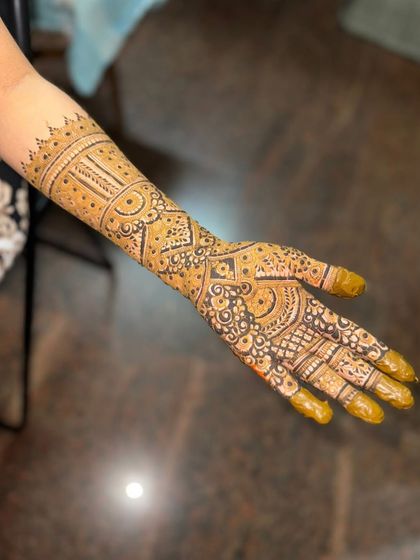 The same design after the stain has started to develop, showing the beautiful orange-brown color.