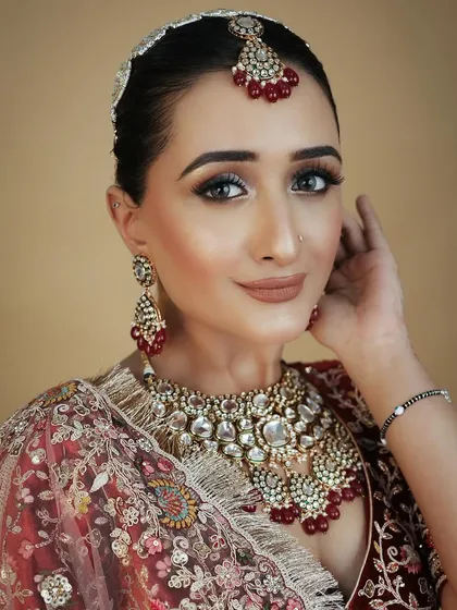 This image showcases the confidence of the model, a direct result of stunning makeup. I teach my students to not just apply makeup, but to empower their clients.