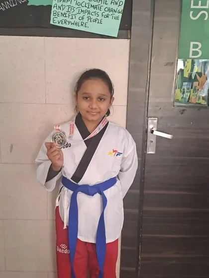 Here is another photo of Sarisha Jha with her Silver medal from the 38th Sub Junior Delhi State Taekwondo Championship. A great achievement for a dedicated student.