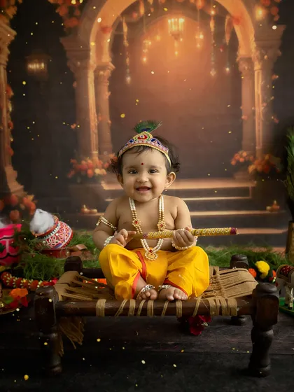 This little Krishna holds his flute, sitting on a traditional charpai for a complete thematic look.