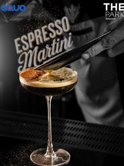 The classic Espresso Martini, dusted with cocoa powder. This vodka-based cocktail gives you the perfect kick to start a relaxed night out with friends at Aqua.