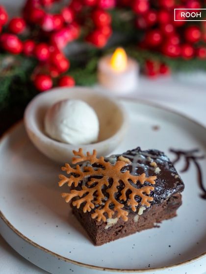 Christmas feasting, sweet repeating. Our festive brownie is the perfect sweet ending to a holiday meal, combining rich chocolate with a cool scoop of ice cream.