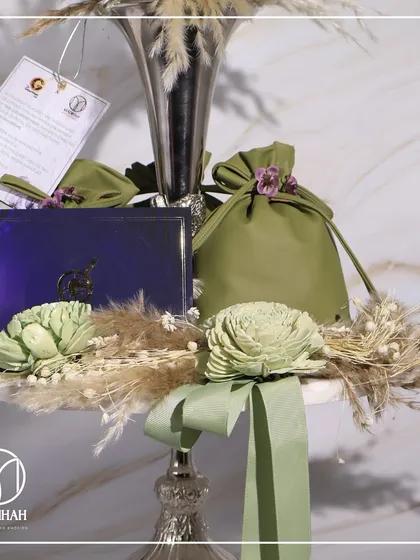 A close-up of the bespoke invitation for The Gourmet Fest, a small token of the luxury experience to come.