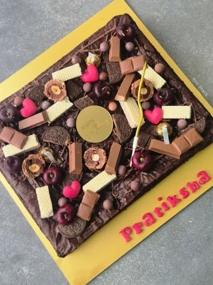 My fudgy and gooey brownie slab is a dream for any chocolate lover. Made with rich coverture chocolate, this egg-free brownie has a perfect crinkled top and can be customized with various toppings for birthdays and celebrations.