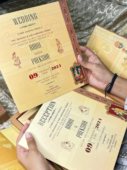 A full set of inserts from a miniature art-inspired suite, held to show the complete, story-like collection for all wedding events.