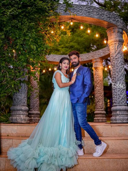 Another beautiful pose at the stone gazebo, showcasing the elegance of the setting.