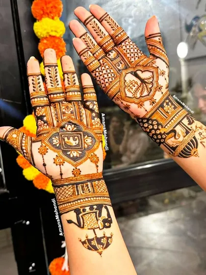 A playful and elegant design with different motifs on each hand. One hand features an elephant in a frame, while the other has a peacock, both complemented by traditional patterns.