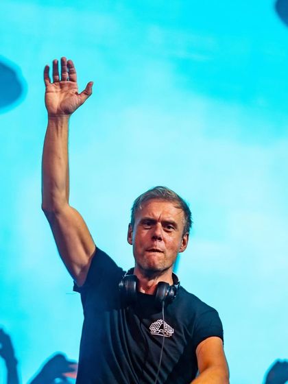 A close-up of Armin van Buuren, the trance legend, waving to his adoring fans in Bengaluru.