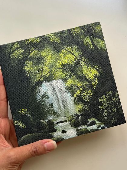 Another angle of me holding the mini waterfall painting.
