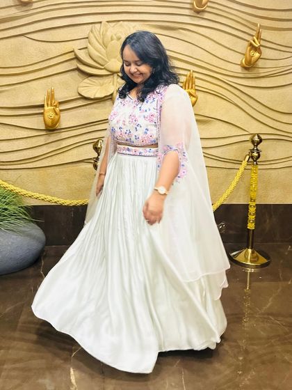 Here you can see the beautiful flow and movement of the pleated skirt on the mint green Indo-western lehenga. It's lightweight and comfortable enough to dance in all night.