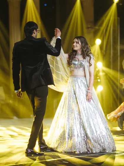 A candid moment from a beautifully choreographed couple's dance. We focus on creating routines that feel natural and joyful, allowing the couple's connection to shine through.