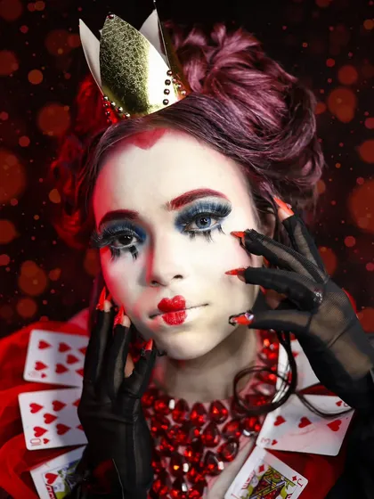 Another portrait of the Queen of Hearts, showing the full makeup and costume.