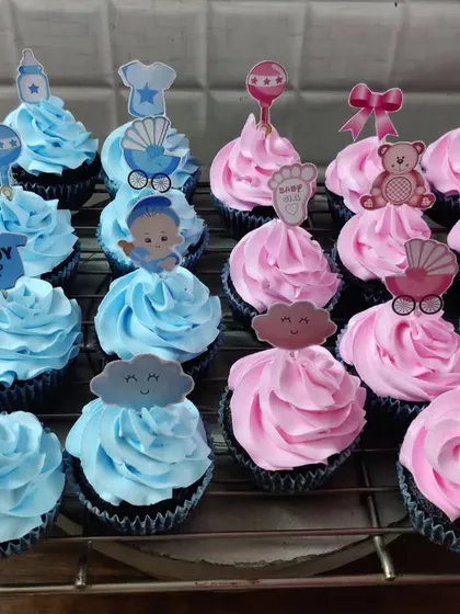 Here is another look at my baby shower cupcakes, showing the variety of toppers available for both "It's a Boy" and "It's a Girl" themes. Each one is a small, sweet way to celebrate the happy news.